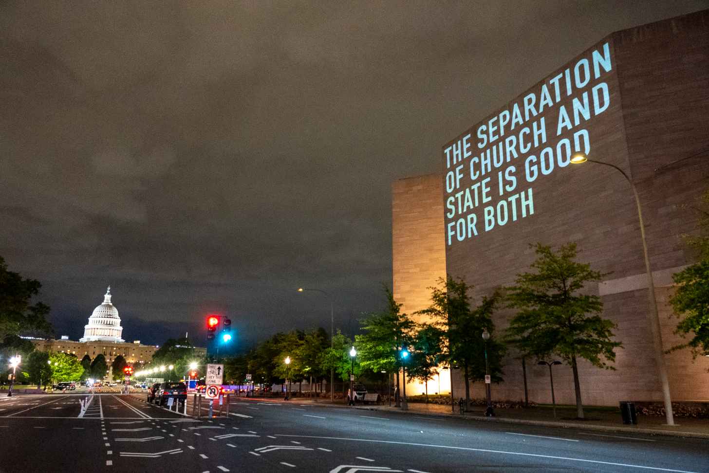 A projection on the National Gallery in Washington DC reads: "The separation of church and state is good for both"