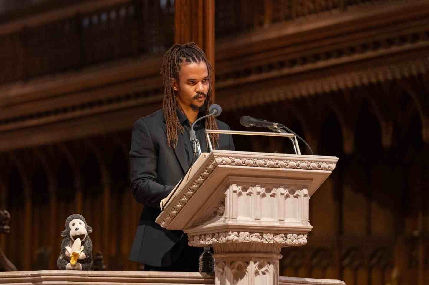 Merlin van Lawick speaking at Jane Goodall's celebration of life in Washington D.C. on November 12, 2025. Photo by the Washington National Cathedral.