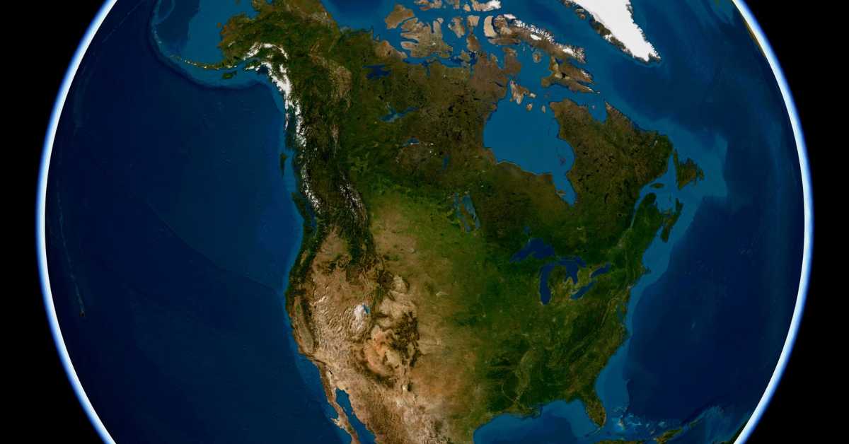 Satellite view of North America showing forests, plains, deserts, mountains, lakes and coastlines, with geographic borders omitted.