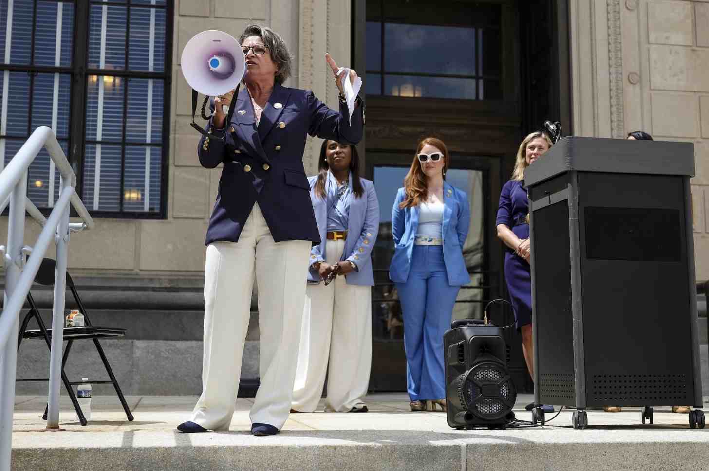 Assemblywoman Luanne Peterpaul (D) speaks outside the Statehouse in support of A2218, a bill meant to protect reproductive and transgender healthcare, on June 11, 2026. (Photo by Anne-Marie Caruso/New Jersey Monitor)