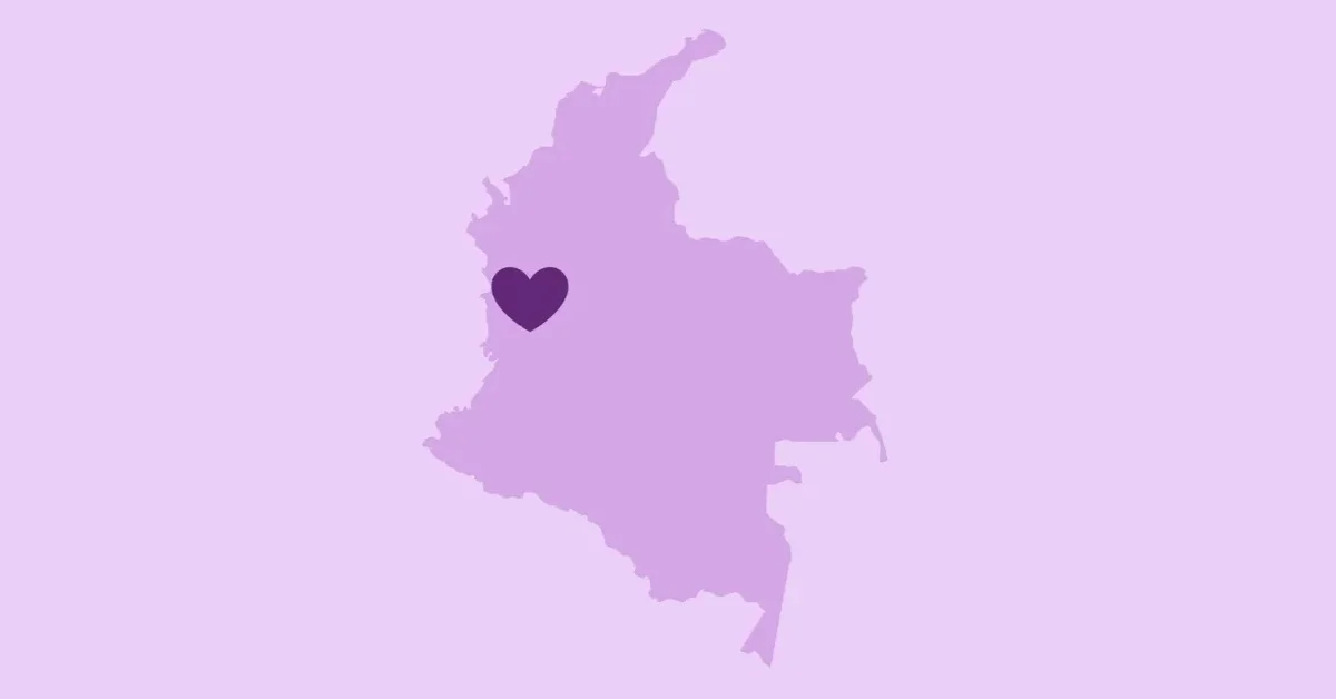 Map of Colombia in shades of purple with a dark purple heart symbol positioned over the northwestern region.