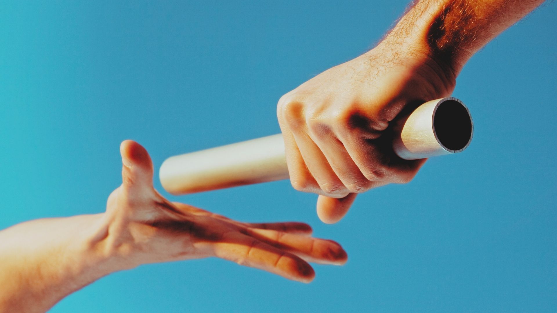 relay race baton hand off