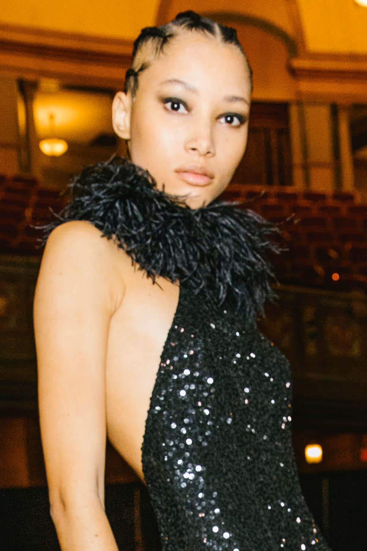 BLACK GOWN WITH PAILLETTE HAND EMBROIDERY AND MARABOU FEATHERS