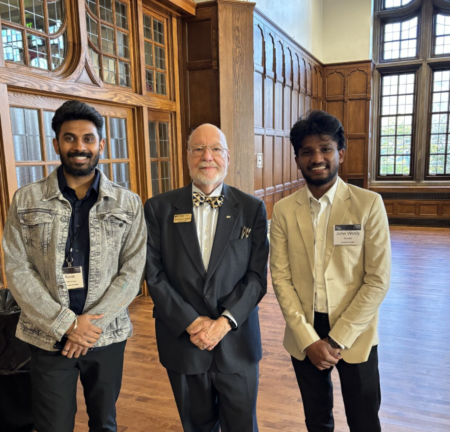 Purdue University Cybersecurity students pose with Center for Education and Research in Information Assurance and Security founder Gene Spafford