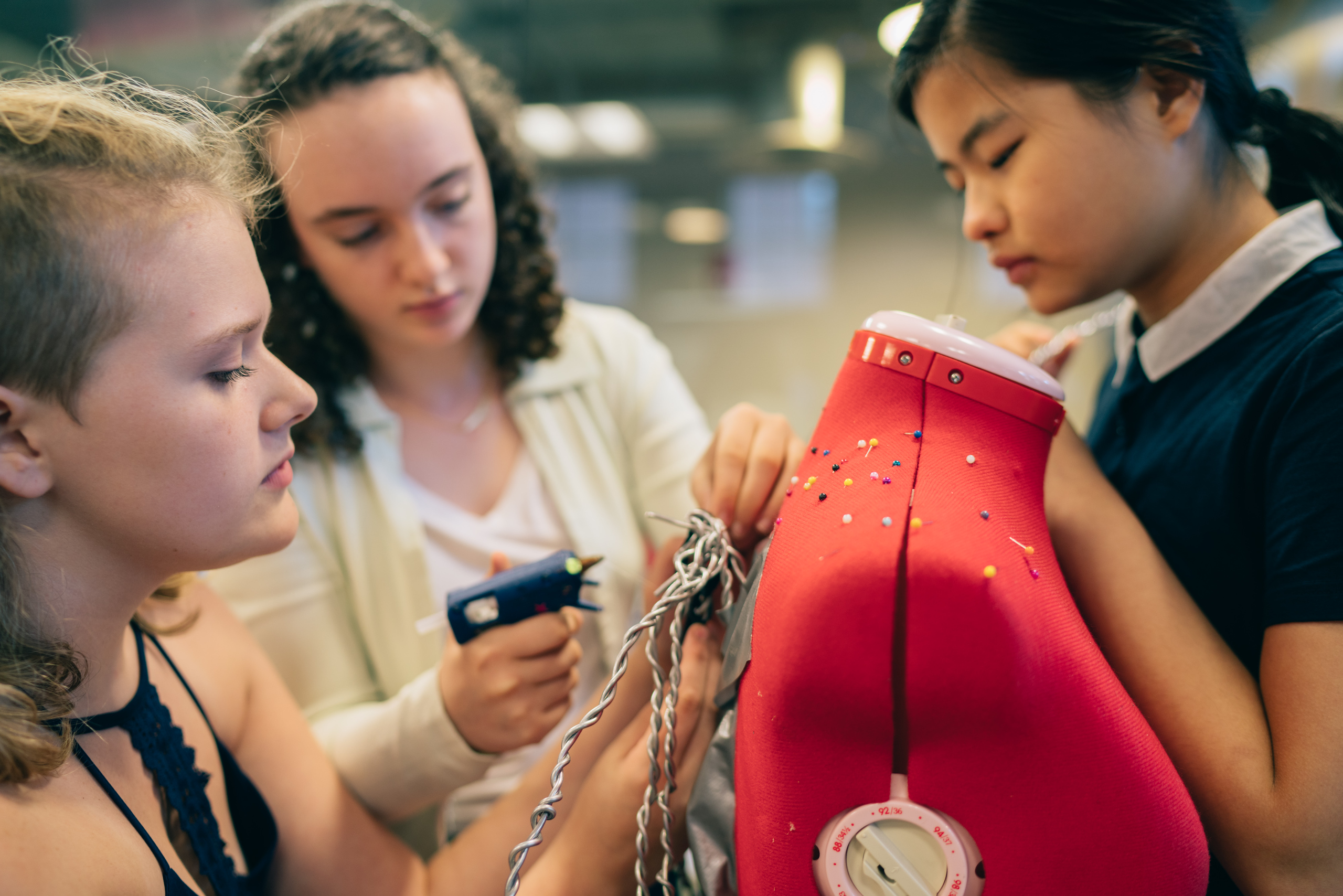 Students making a quick cardboard prototype