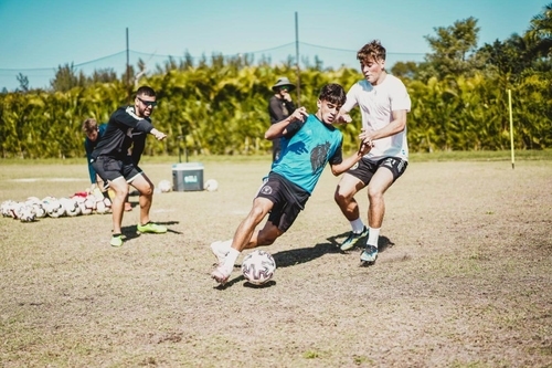 SAT Soccer athletes participate in a drill