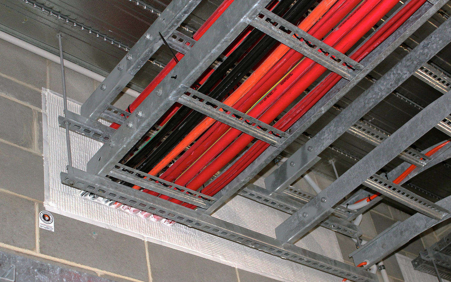 Fire prevention tubing layout for pipes and wires