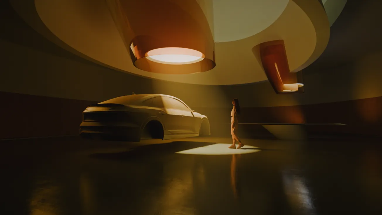 Woman standing in spotlight near a car inside a dimly lit modern room with large circular ceiling lights.