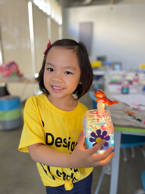 A proud student sharing their project.