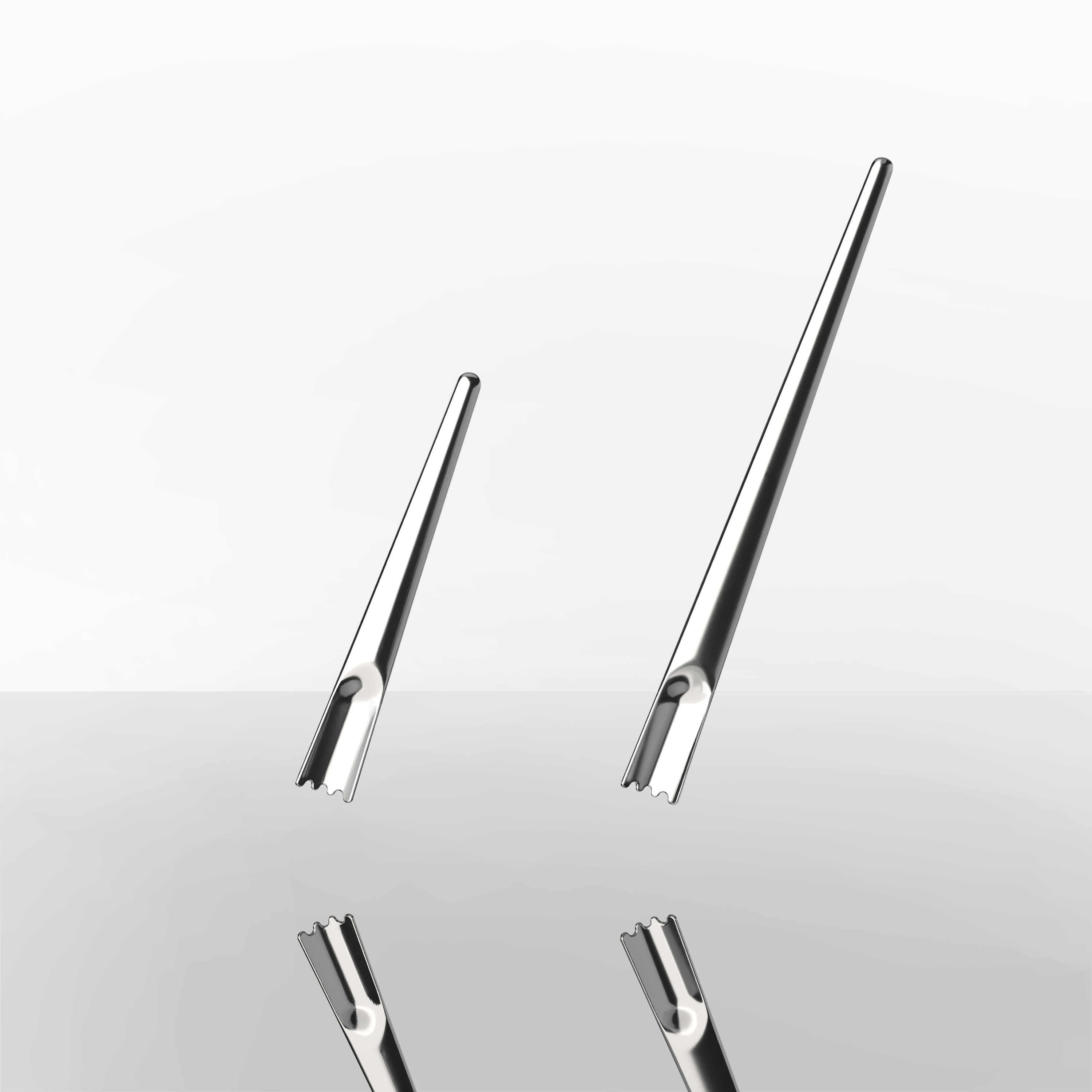 Small and large versions of the cocktail spoon in high polished steel.