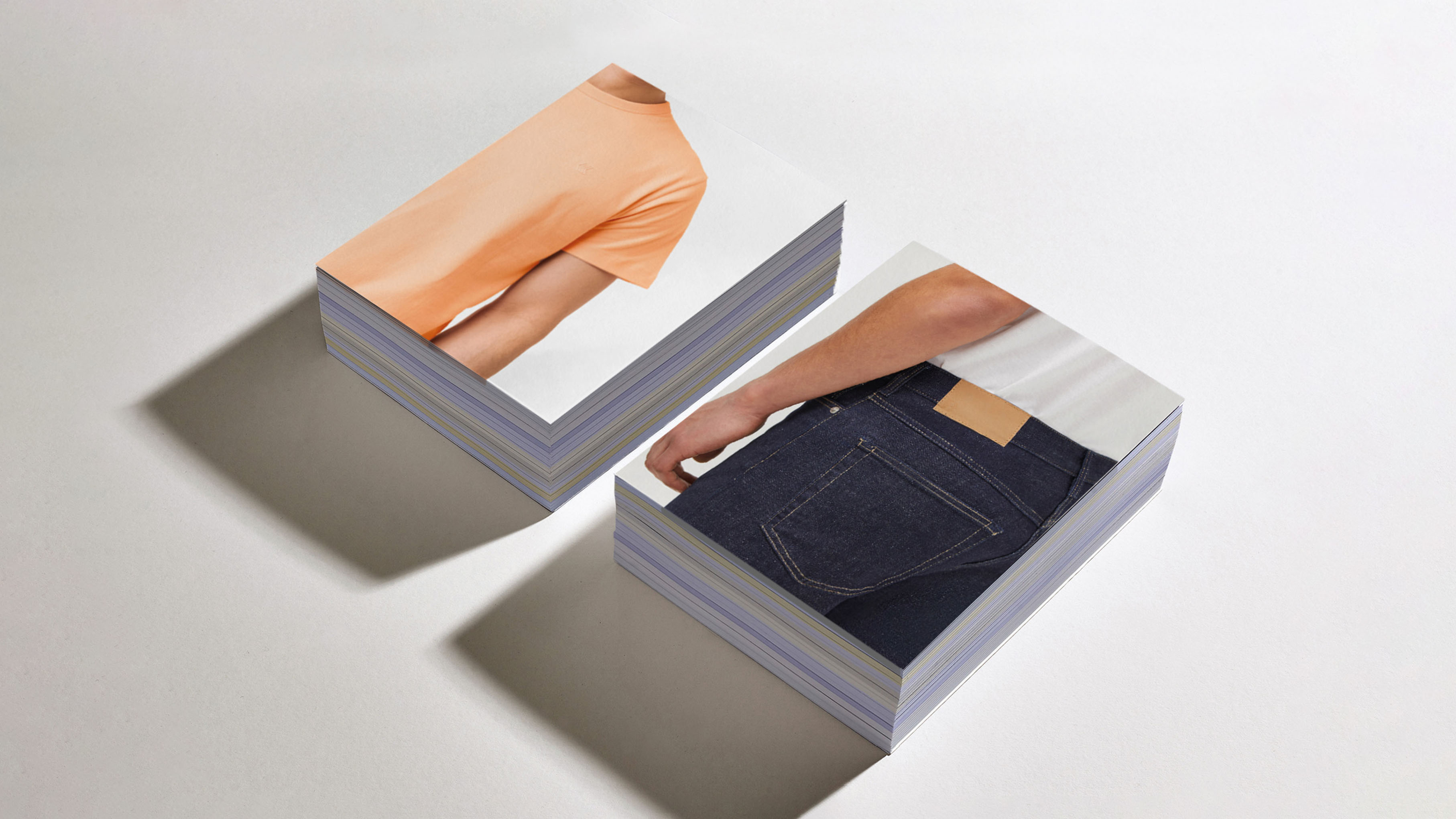 Partially open booklet with a dark cover titled 'STEP IN' and visible pages featuring text headings 'YOU ARE NOT ALONE' and 'CONFESS IT' on a dark blue background.