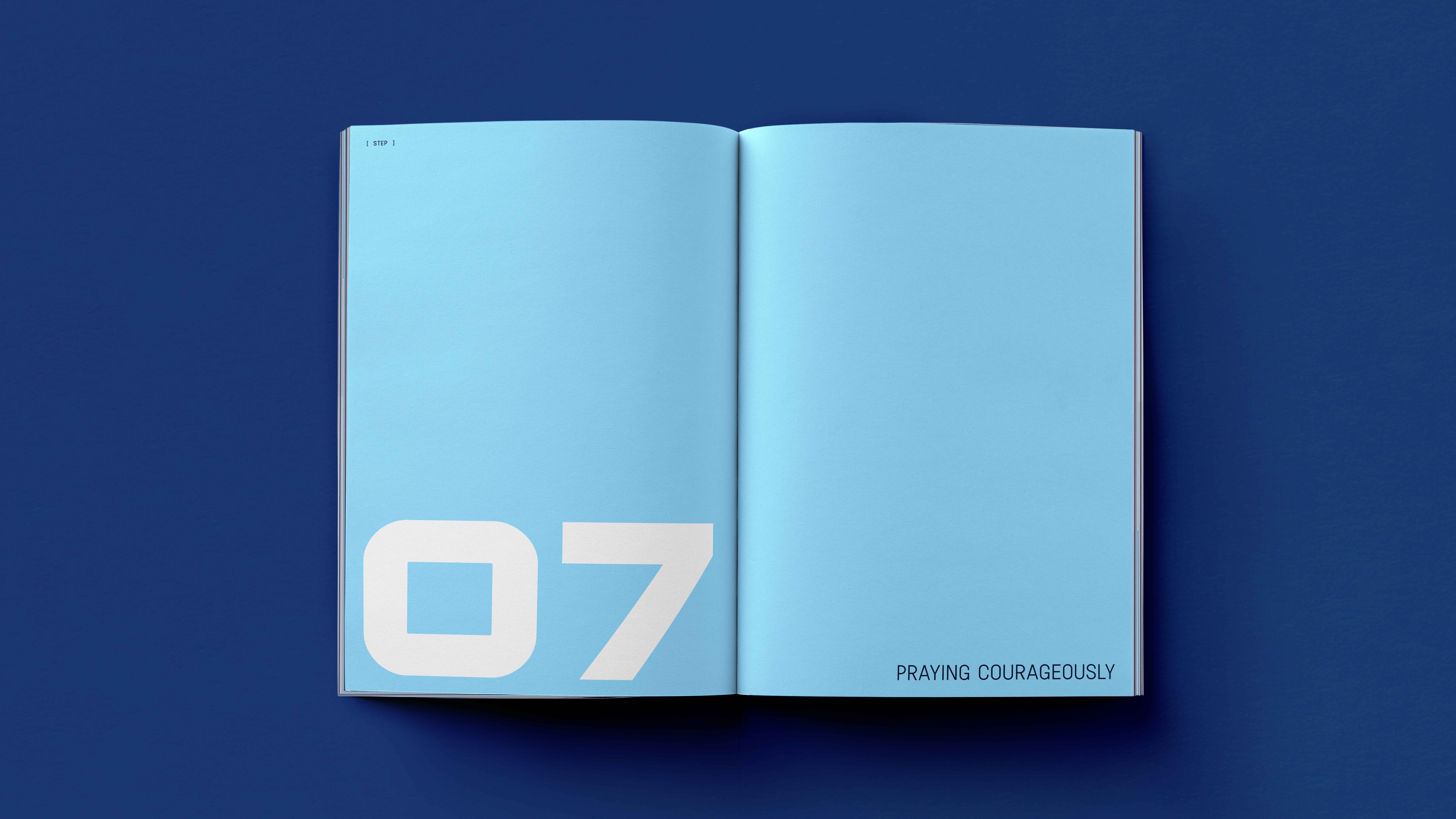 Open book with light blue pages featuring large white number 07 and text 'Praying Courageously' on a dark blue background.