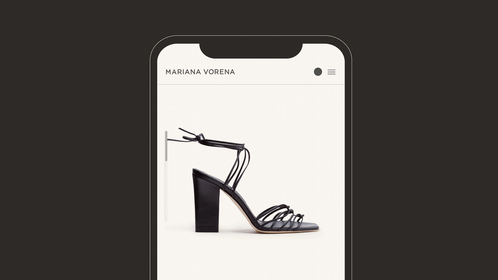 Black high-heeled sandal with multiple thin straps and ankle ties displayed on a mobile screen interface.