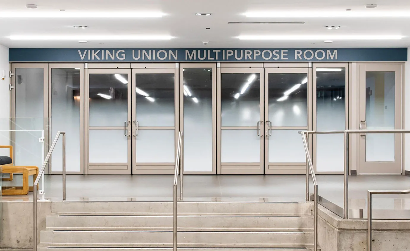 signage above doorways at the Viking Union Multicultural Center created by Infinity Images