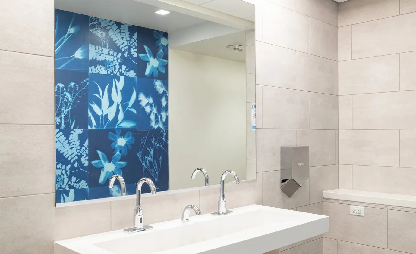 Bathroom in the Portland Building with wall graphics made by Infinity Images