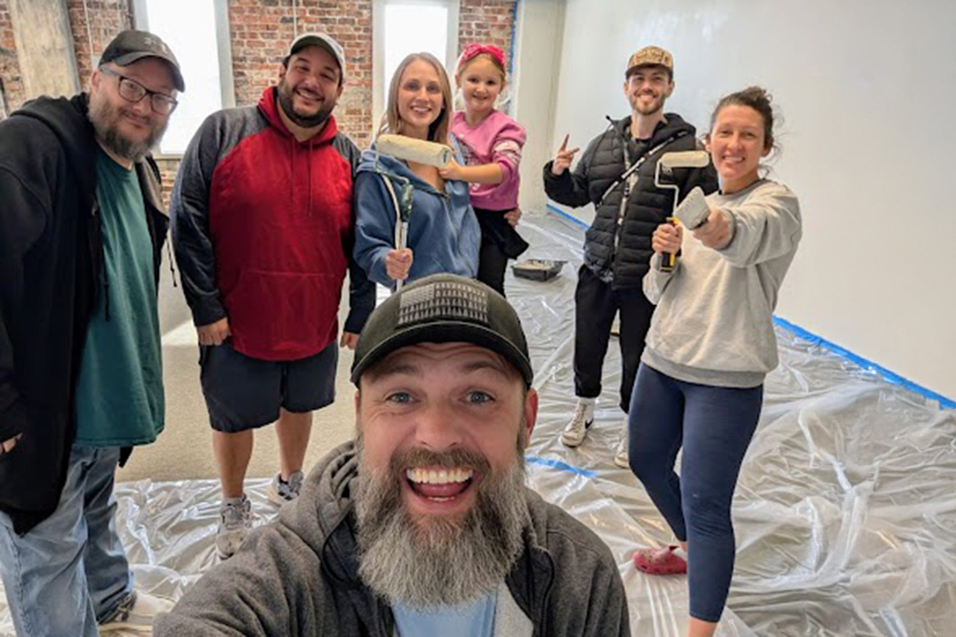 storm cloud team painting the new office