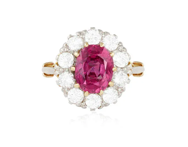 A RUBY AND DIAMOND CLUSTER RING