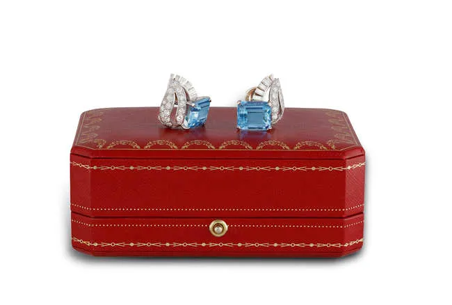 A FINE PAIR OF AQUAMARINE AND DIAMOND EARCLIPS, MOUNTED BY CARTIER, CIRCA 1965