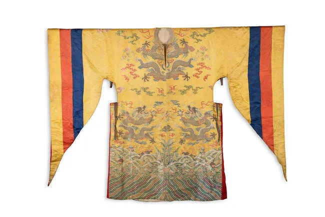 A YELLOW-GROUND SILK DRAGON BROCADE CEREMONIAL ROBE