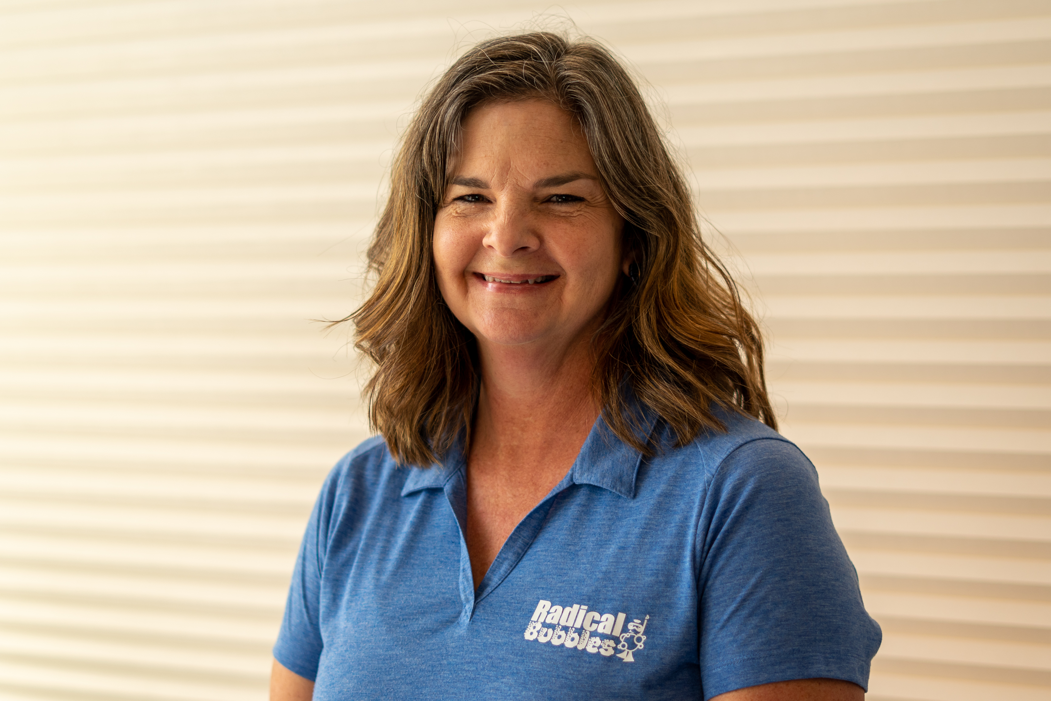 head shot of owner Ann smiling