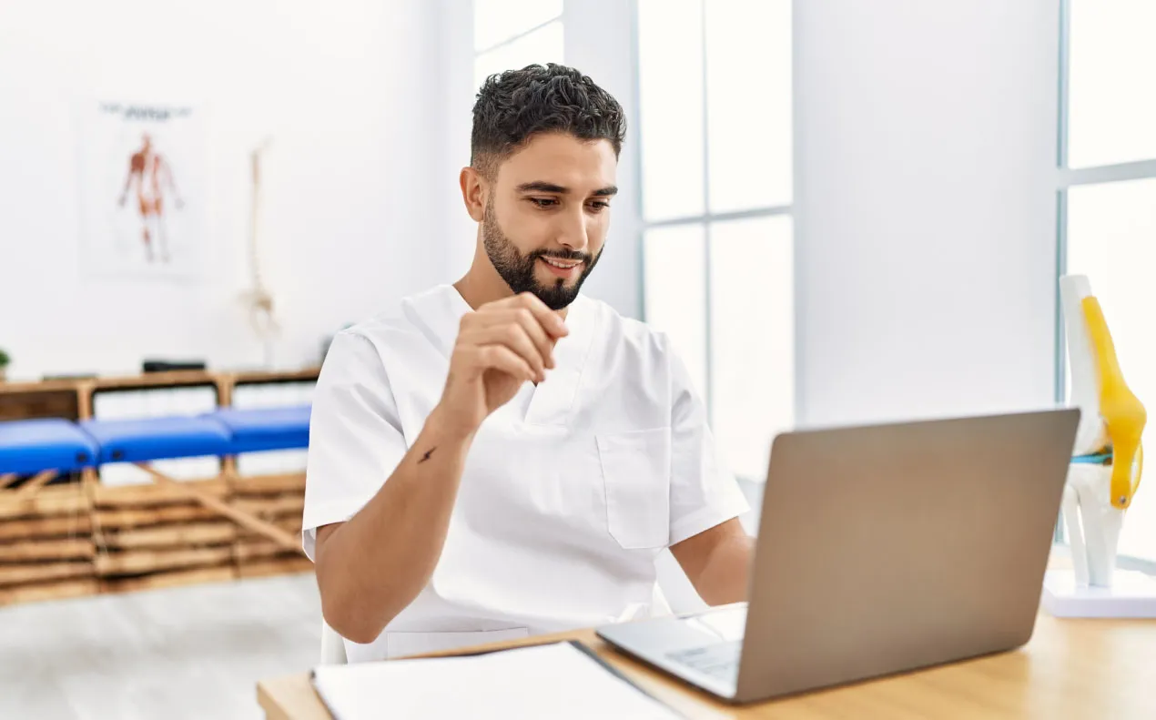 men sitting with laptop