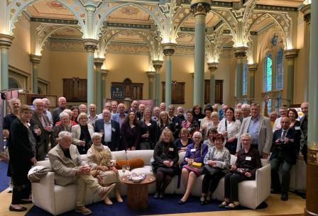 Two members arm in arm at ANZ Retired Officers' Club function