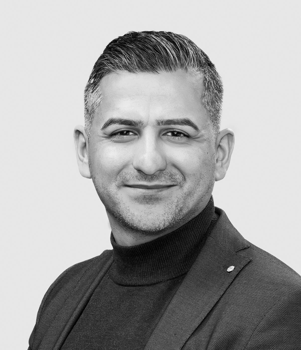 Headshot of Reza Ahmadi