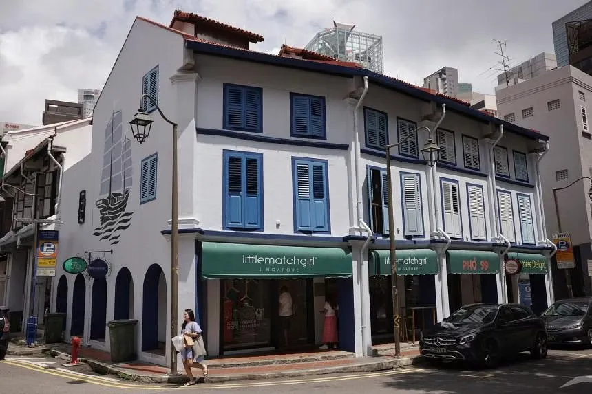 The row of shophouses (from left) at 55, 56, 57 and 58 Amoy Street. Its tenancy has been renewed for another three years from 2023. ST PHOTO: KEVIN LIM