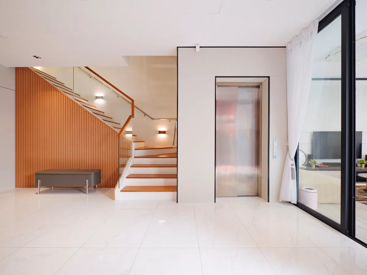 Level 1 private foyer featuring a Schindler Private Home Lift