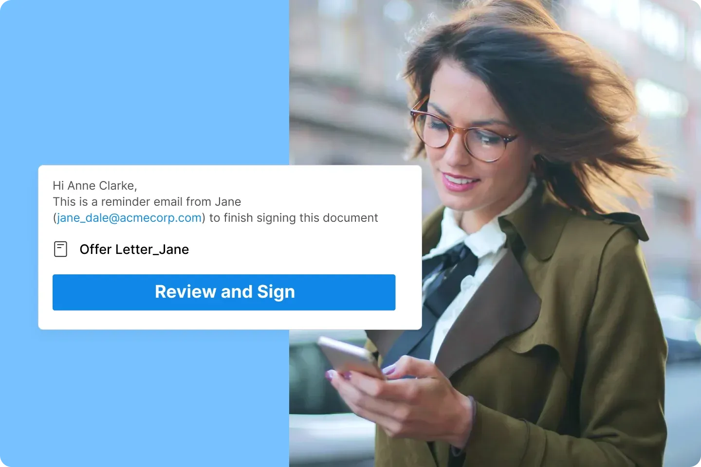 Woman checking phone while signing reminder email with review and sign button