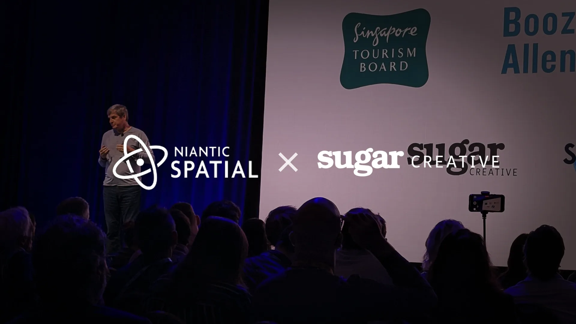 Niantic Spatial and Sugar Creative presenting at a conference