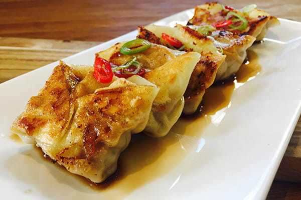 Chinese pan fried dumplings on a plate