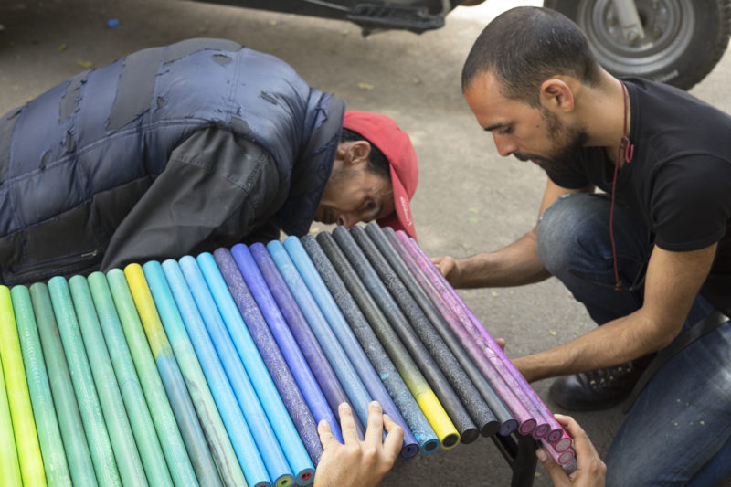 men working on a bench