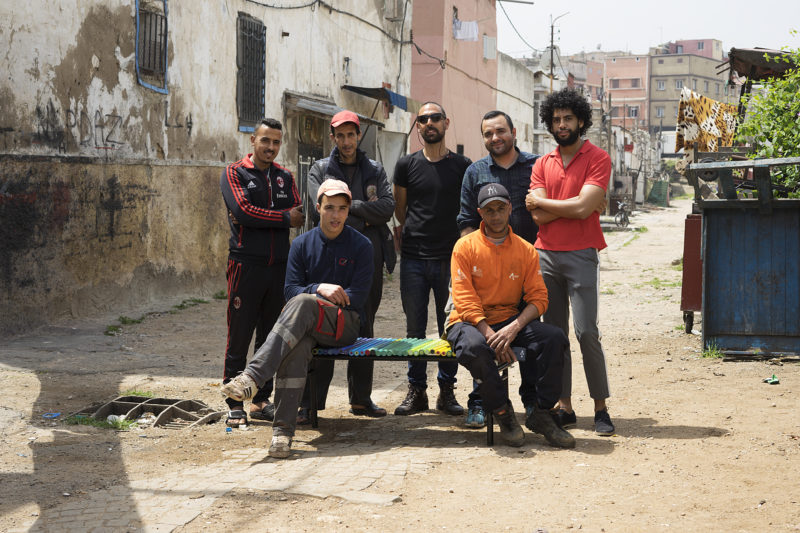 men after working on a bench project