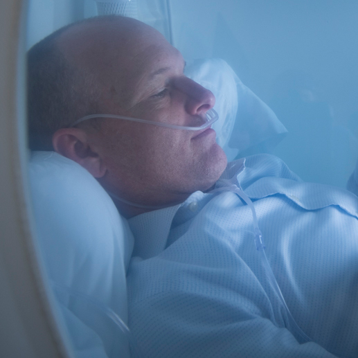 Man in hyperbaric chamber
