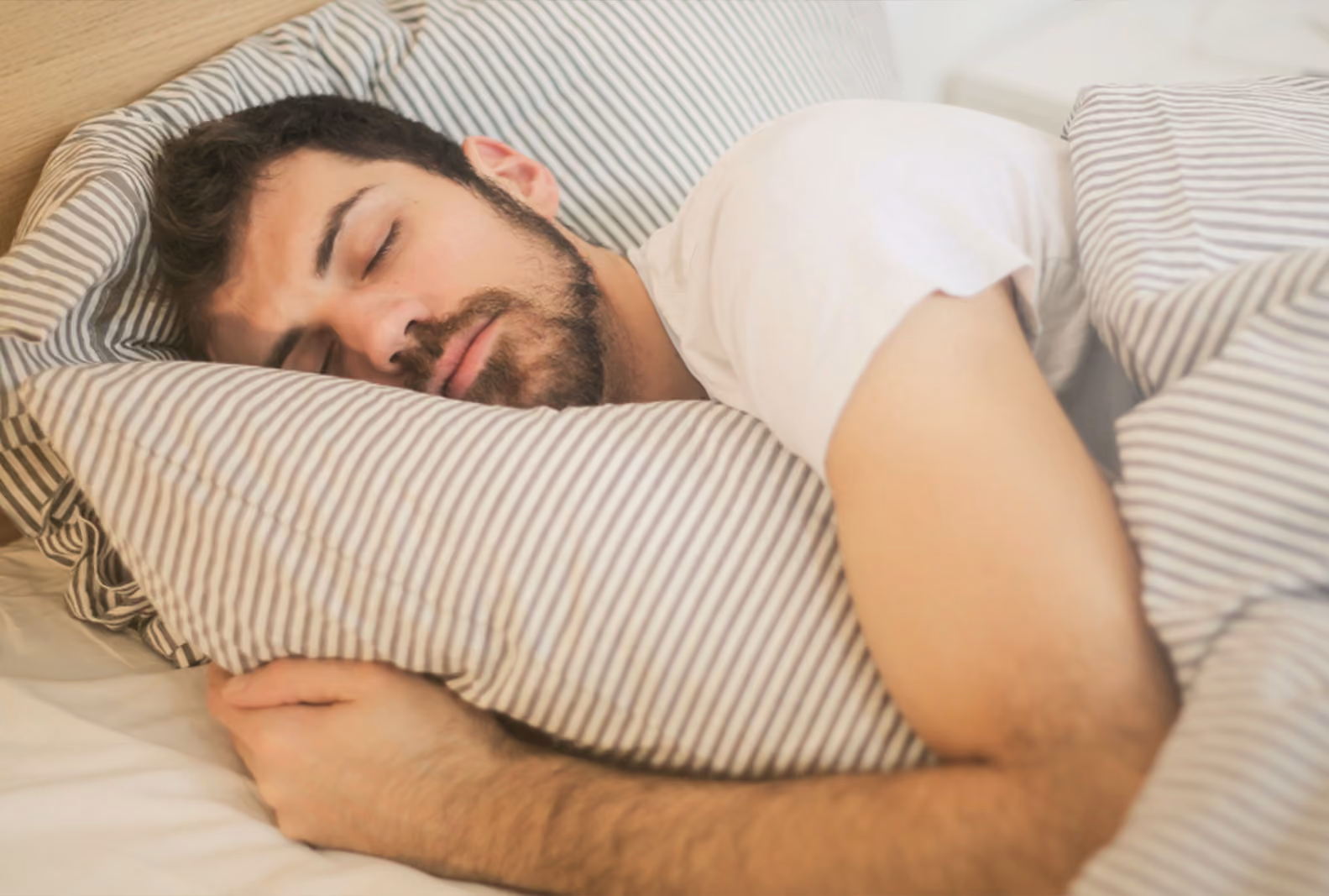 Person measuring blood glucose and sleep 