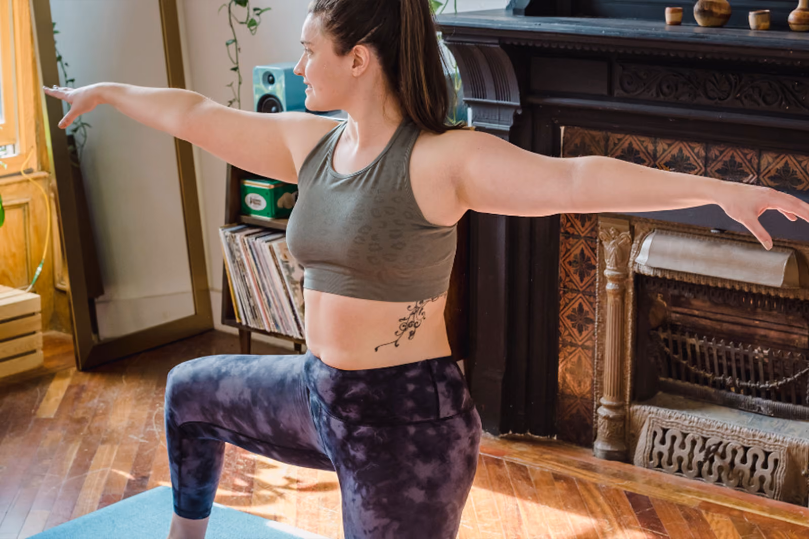 Woman exercising in her living room