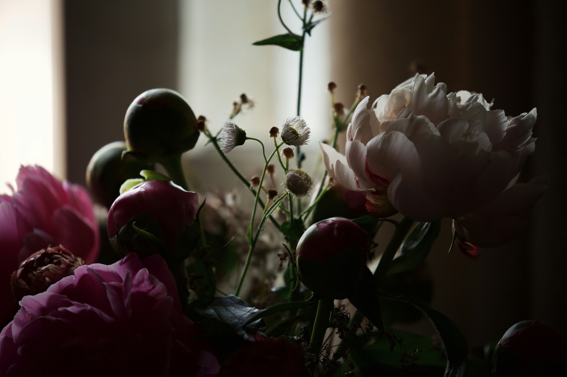 A bouquet of flowers at a funeral home.