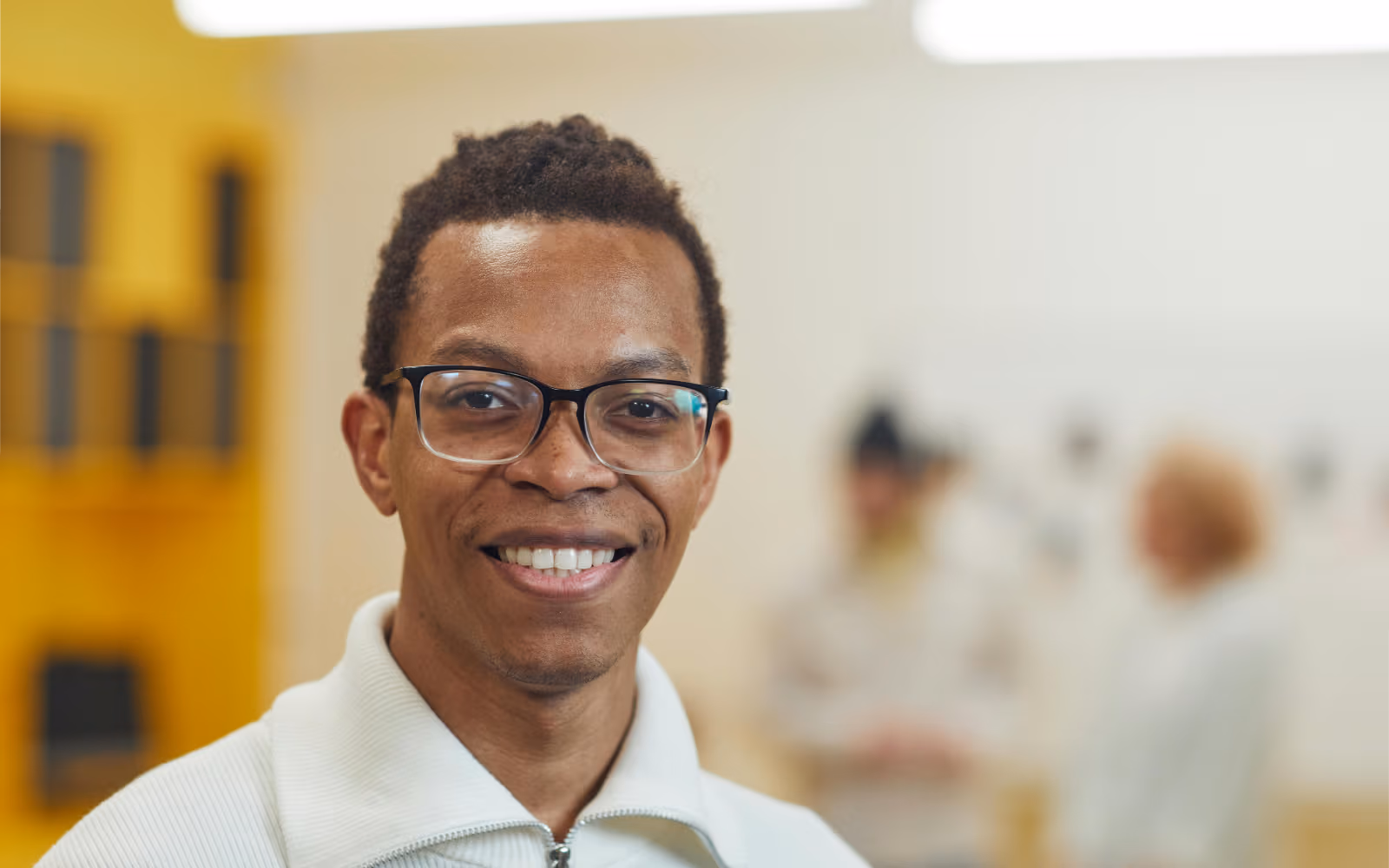 Smiling man wearing glasses
