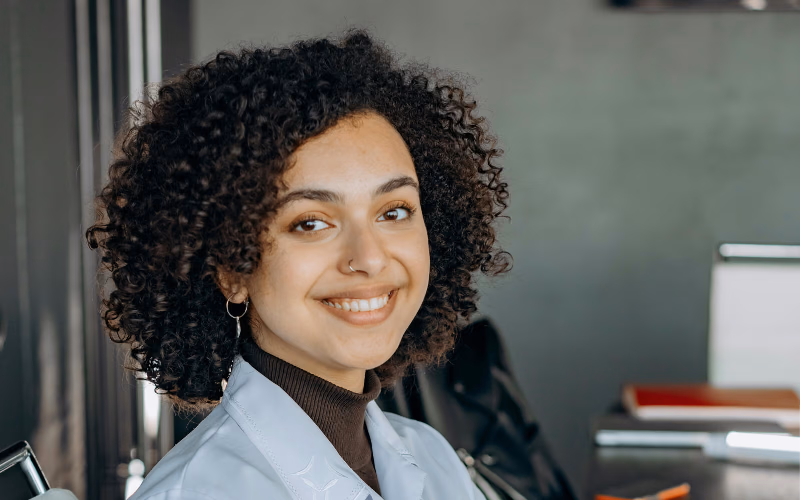 Smiling woman with curly hair