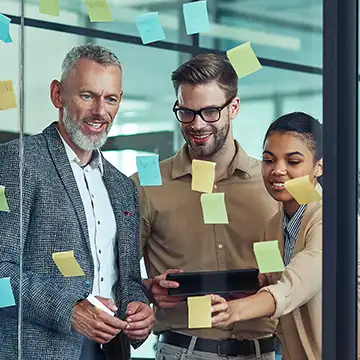 Image of executives in a Teamland AI Corporate Training Workshop