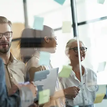 Image of managers in a Teamland AI Corporate Training Workshop