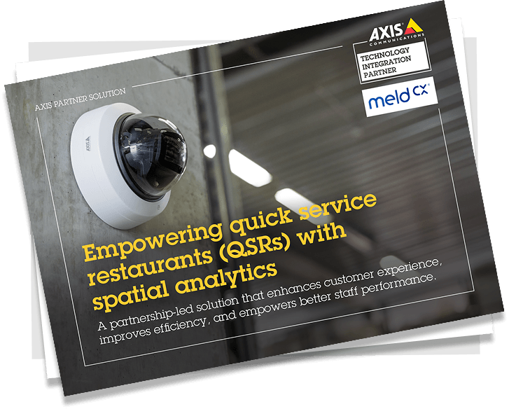 Security camera mounted on a wall with text about empowering quick service restaurants with spatial analytics by Axis Communications and Meld CX.