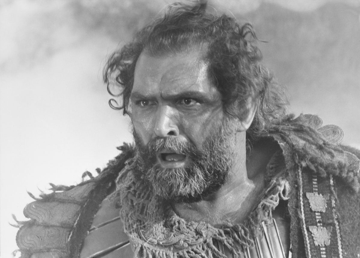 Film still from Iphigenia showing large angry warrior man