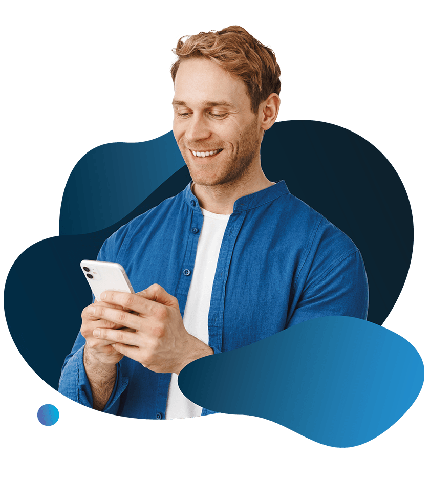 Smiling man in a blue shirt looking down at his smartphone against a blue abstract background graphic.