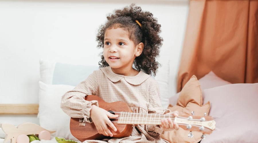 Girl playing ukelele