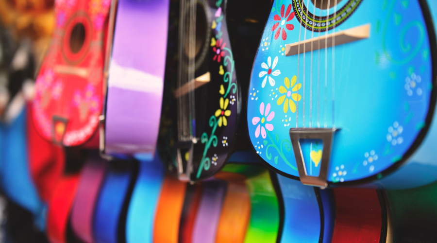 A selection of colourful guitars
