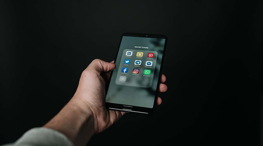 Phone screen showing social media platforms