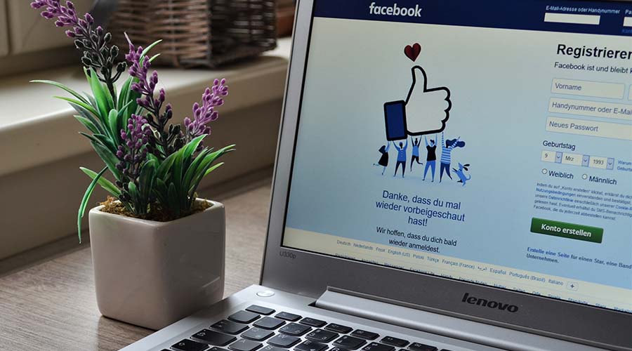 Laptop showing a social media platform