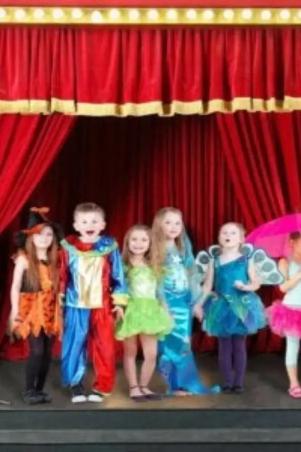 toddlers in costume on stage
